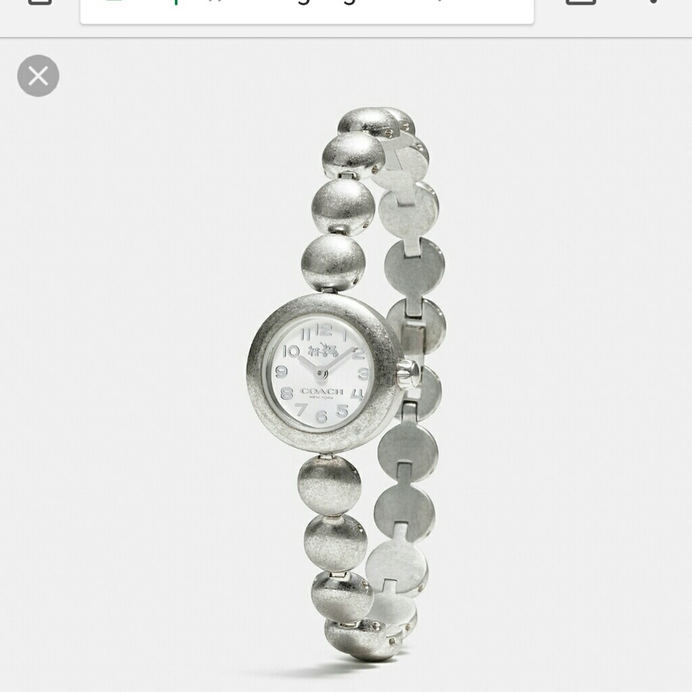 Coach stainless steel vintage style watch.
